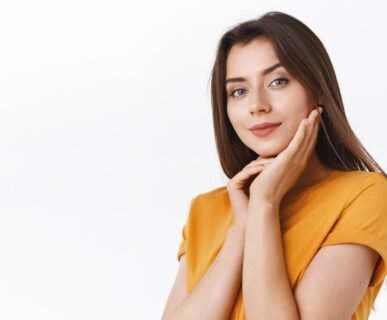 Professional aesthetic treatments at AM Aesthetics London - confident client after treatment